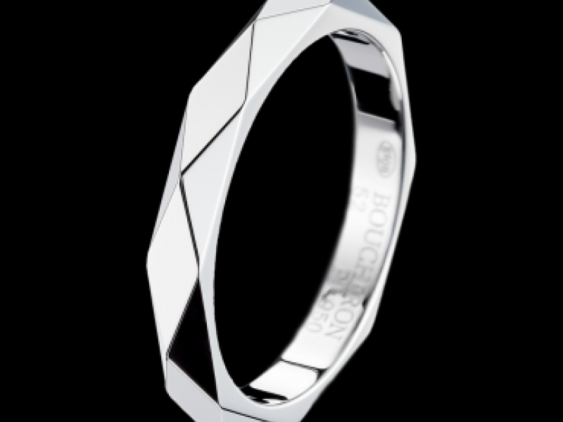 Boucheron - Facette Platinum wedding band The platinum wedding band is sculpted, cut then polished to re-create the multiple facettes of a diamond.