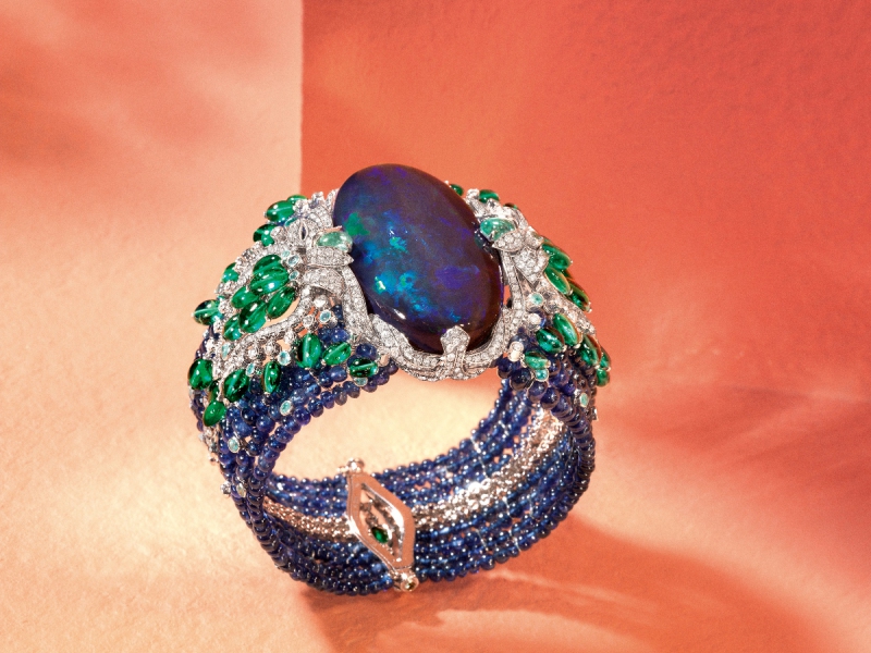 Cartier Lagon Bracelet set in platinum, one 85.42-carat oval- shaped cabochon-cut black opal, sapphire beads, emerald long beads, Paraiba tourmalines, brilliant- cut diamonds. Etourdissant Collection