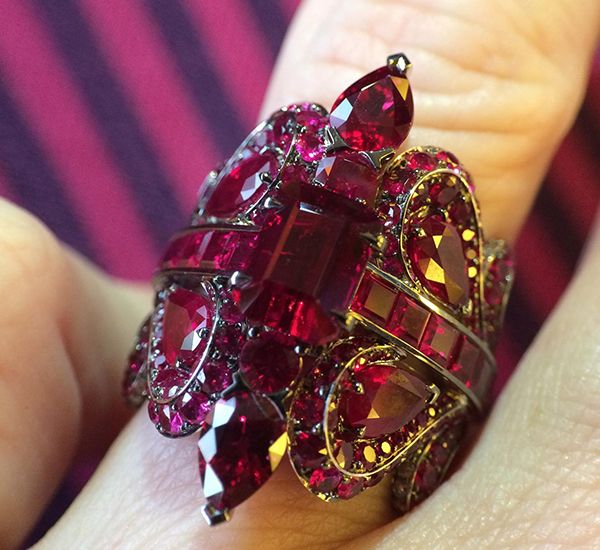 John Rubel Louise Ring fully paved with Rubies and gold diamonds on the inside of the ring.