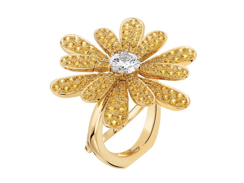 Poiray Flower Poiray set with a central diamond and yellow sapphires moving petals