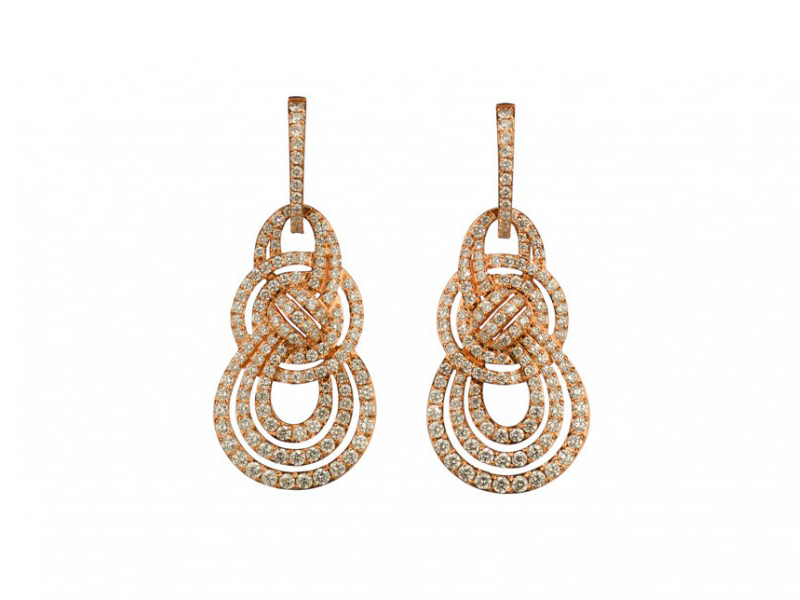 Garrard From Entanglement collection - a pair of rose gold earrings set with white diamonds