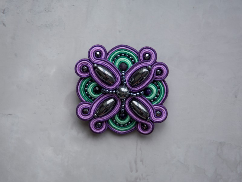 Nowness Lakshmi Purple-Green - Swarovski brooch is available at the Pop Up, ~ CHF 167