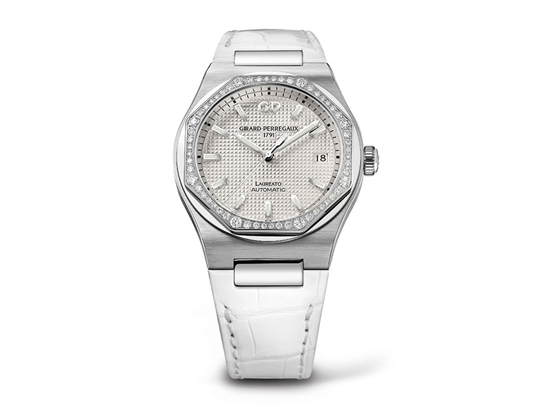 Girard Perregaux Laureato in steel with bezel paved with diamond. Mounted on an aligator bracelet with a folding clap.