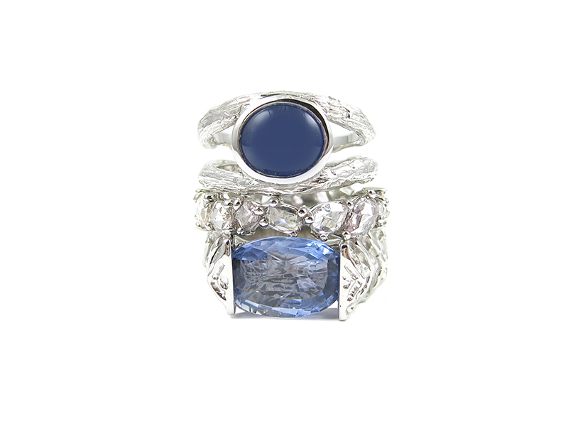 Katey Brunini Small double Twig ring in white gold with Cabochon shaped sapphire, Skipping Stones ring in platinum with pink diamonds and Large Vertebrae ring in white gold with oval shaped Sapphire