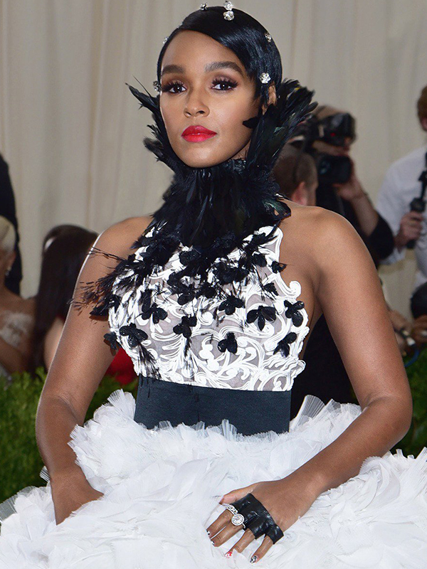 Tiffany & Co Janelle Monae wore diamond earrings and five diamond rings.