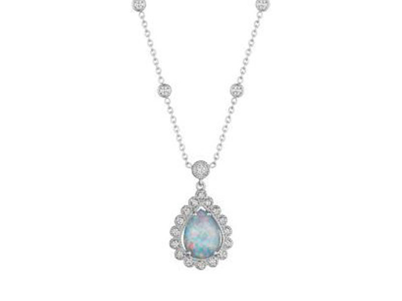 4- Penny Preville Scalloped pear shape opal triplet necklace is mounted with a white opal and diamonds.