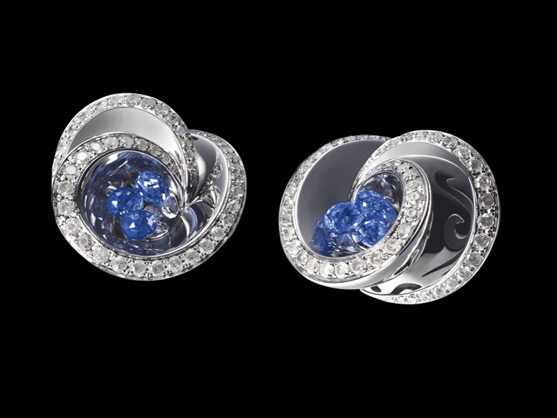 10- De Grisogono - Chiocciolina Earrings Mounted on white gold  and set with icy white diamonds, the earrings comprise  briolette-cut blue sapphires.