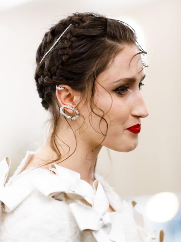 Ana Khouri Anna Cleveland wore diamond earrings.