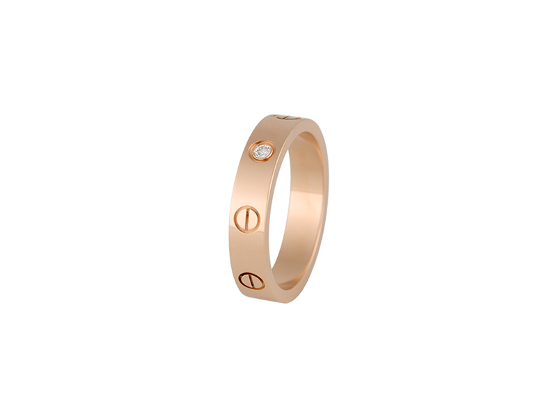 Cartier Love rings mounted on pink gold with one diamond