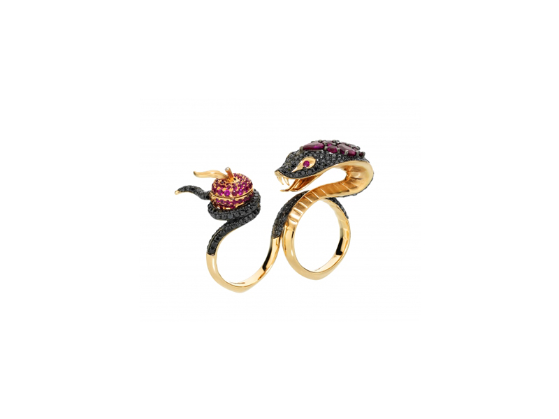Stephen Webster The two finger ring temptation of eve ring created in 18 karat rose gold displays a serpent set with black diamonds holding a ruby studded apple