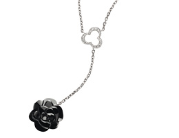 Camélia Necklace by Chanel sculpté in black onyx, 18k white gold and diamonds