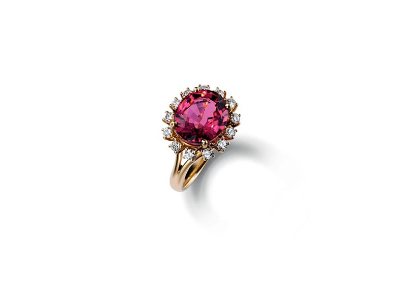 Dolce & Gabbana Ring oval purplish pink tourmaline set in an elaborate bezel enhanced by fourteen round diamonds