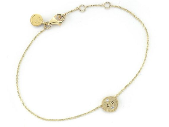 Buja Diamond button bracelet mounted on yellow gold with white diamonds 