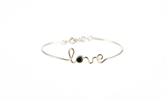 By Elia Love bracelet mounted on 18ct white gold with one black diamond
