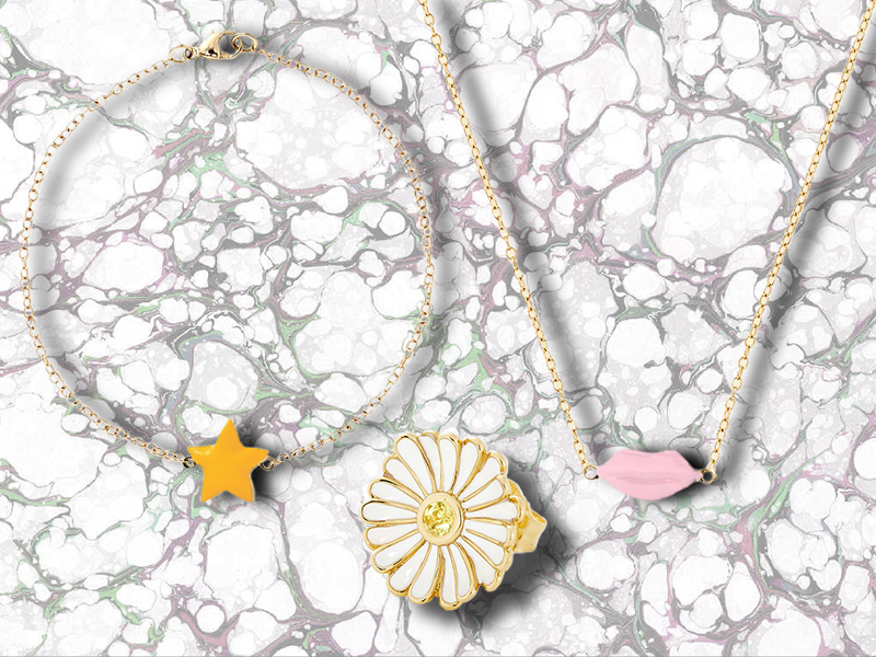 Alison Lou Enamel Daisy Stud 14K Yellow Gold ring, accented with white enamel petals and a single Yellow Sapphire center; Enamel Star Bracelet made of 14K Yellow Gold with a yellow enamel star, and Enamel Lip Necklace made with 14K Yellow Gold and pink Enamel Lips