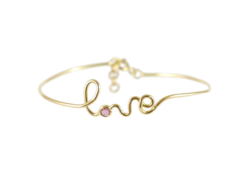 By Elia - Amour bracelet, mounted on yellow gold set with a pink ruby