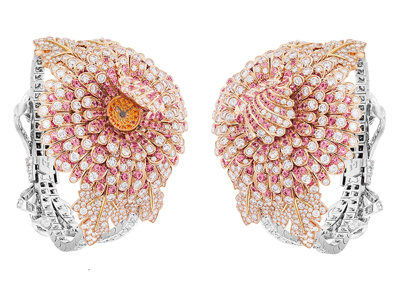 Van Cleef & Arpels - Montre Chrysanthème Secret avec cadran en or jaune serti de grenats spessartites, et de pétales en or rose sertis de diamants et de sapphires roses 