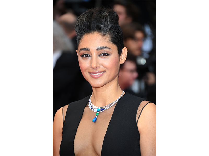 Cartier - Golshifteh Farahani wore Magnitude High Jewellery necklace in white gold set with one 5.32-carat sugarloaf emerald from Colombia, two cabochon-cut black opals from Australia totaling 25.24carats, lapislazuli, baguette-cut diamonds and brilliant-cut diamonds.