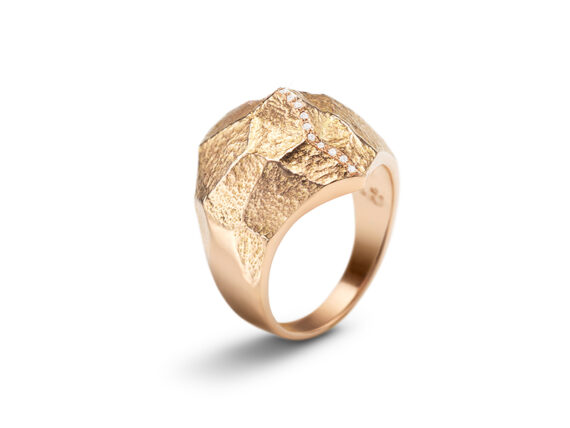 Altitude ring mounted on rose gold set with diamonds